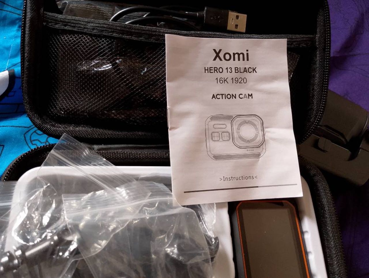 Action Cam xomi hero 13 black+ estabilizador dual axis A10 trípode